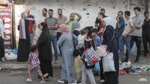 Residents of Gaza city begin to evacuate following an Israeli warning of increased military operations