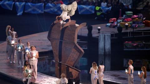 Stella and the Dreamers encounter the Raging Bull during The Opening Ceremony of the Birmingham 2022 Commonwealth Games at Alexander Stadium on July 28, 2022