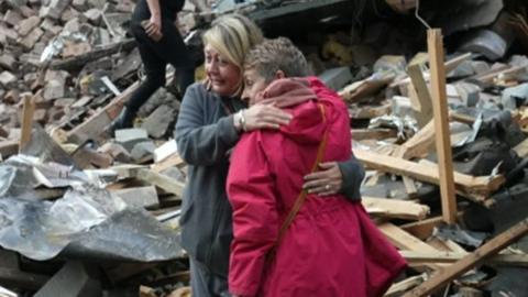 Campaigners at the site of the Crooked House ruins