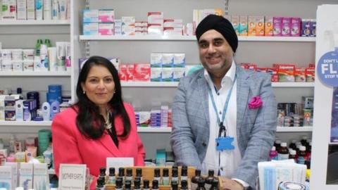 Priti Patel and Dimple Bhatia inside the Tollesbury Pharmacy
