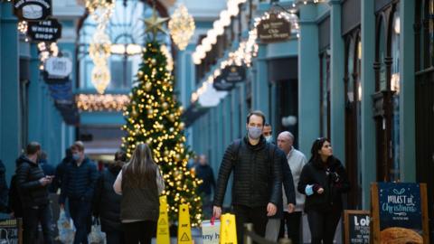 Shoppers in Birmingham's Great Western Arcade