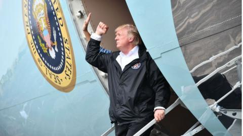 US President Donald Trump boards Air Force One at Ellington Field on September 2, 2017, before departing for Louisiana