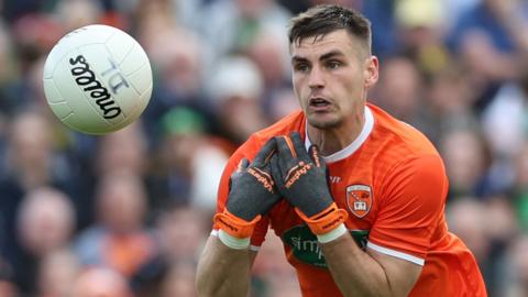 Greg McCabe distributes the ball for Armagh