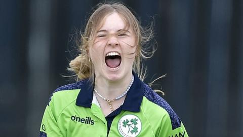 Georgina Dempsey celebrates taking a wicket