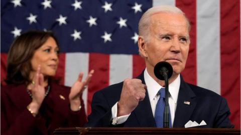 Joe Biden flanked by Kamala Harris