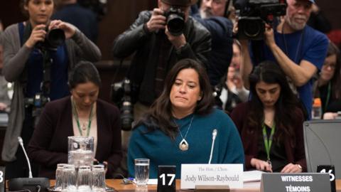 Jody Wilson-Raybould, former Canadian justice minister, is surrounded by journalists