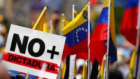 A sign seen during an opposition rally in Caracas, Venezuela, April 8, 2017.
