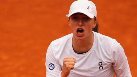 Iga Swiatek celebrates beating Donna Vekic at the Italian Open