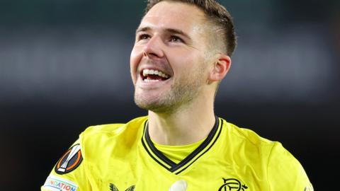 Rangers goalkeeper Jack Butland smiles