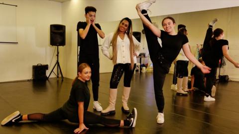 Nadia Jane and members of her dance class