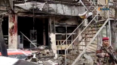 Screengrab of video published by the Syrian Kurdish Hawar News Agency (ANHA) showing the aftermath of a suicide bomb attack in Manbij, Syria (16 January 2019)