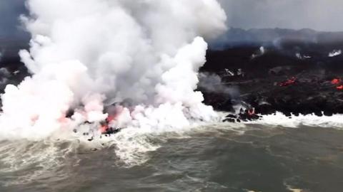 Kilauea volcano lava meets the sea