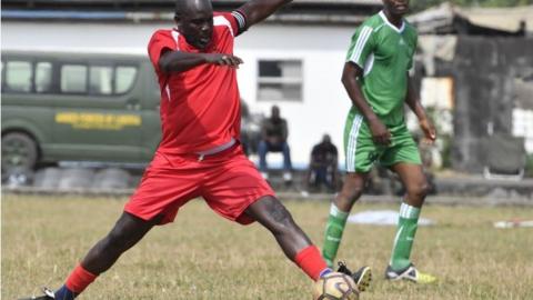 George Weah plays in pre-inauguration match
