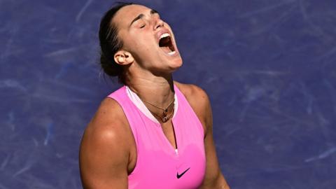 Aryna Sabalenka reacts after losing a point to USA's Emma Navarro
