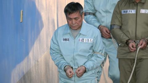 South Korean pastor Lee Jaerock arrives at the Seoul Central District Court to attend his trial in Seoul on November 22, 2018.