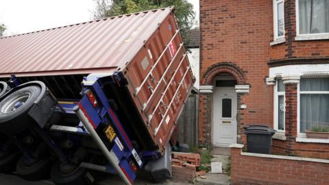 An articulated lorry which hit a bridge in Coombe Valley Road, Dover, this morning