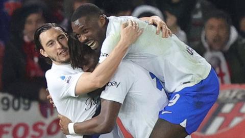 Yann Bisseck celebrates with his teammates after scoring first goal for Inter Milan against Bologna in Serie A