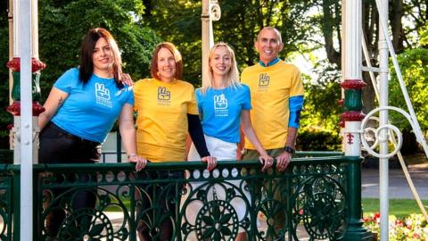 Swindon Welcomes Ukraine group standing in gazebo