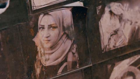 Posters of killed activist Sara Talib Lodya's friend in Basra Square