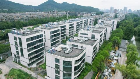 An aerial view of the unfinished luxury housing development that has existed for more than a decade by the Qiantang River in Hangzhou, East China's Zhejiang Province, July 18, 2022.