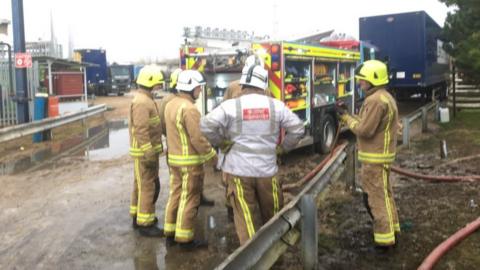 Firew crews at the recycling plant in North Cave