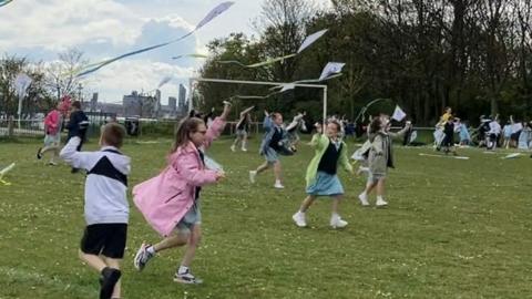 Children flying kites