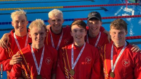 The Isle of Man men swimmers with their gold medals