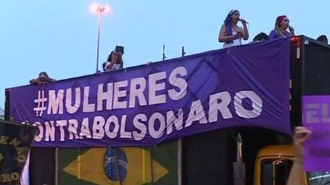 A bus reads "Women against Bolsonaro" in Rio de Janeiro, Brazil on 29 September 2018