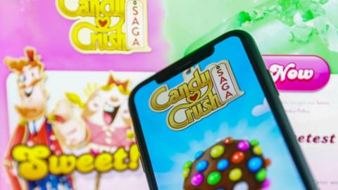 Candy crush shown on a phone screen