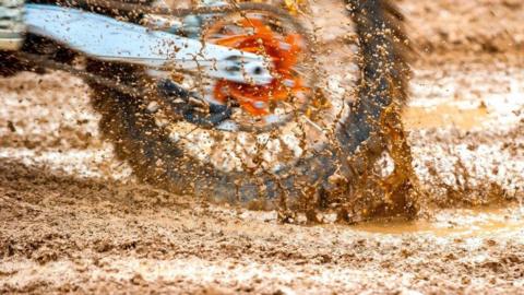 Motorbike tyre in the mud