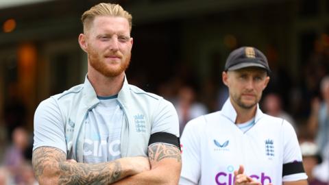 England captain Ben Stokes (left) and Joe Root (right) look on