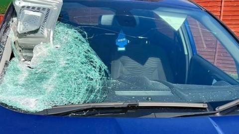 A microwave embedded in a car windscreen