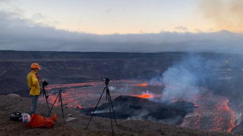 A man seen documenting Kilauea's eruption on 5 January, 2023