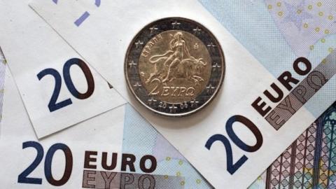 Greek euro coins and bills