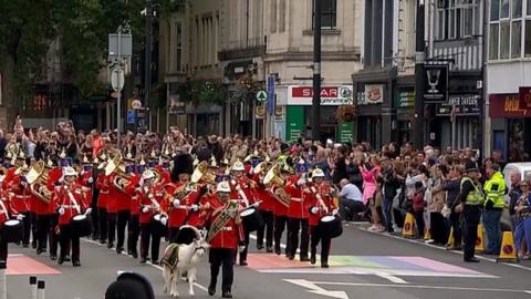 Crowds gathered on the streets of Cardiff for a march to mark the proclamation of King Charles in Wales