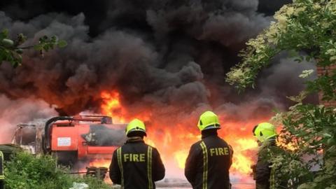 Firefighters at the scene of the fire