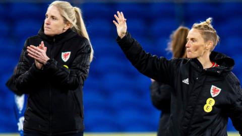 Gemma Grainger and Jess Fishlock wave to Wales' fans