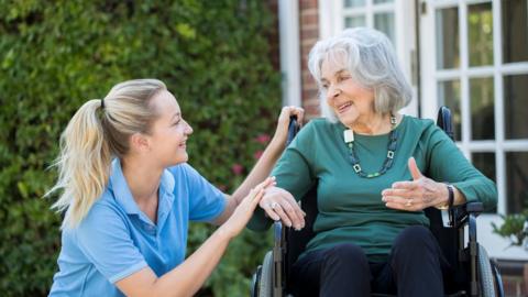 Older person with carer