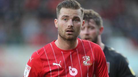 Jordan Lyden in action for Swindon Town