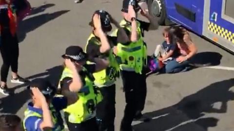 Police doing macarena