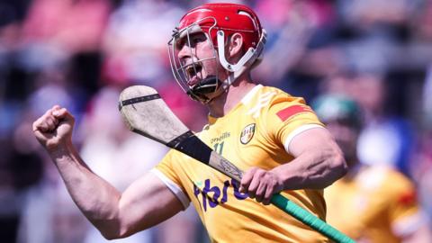 Conor Johnston celebrates after scoring one of Antrim's first-half goal