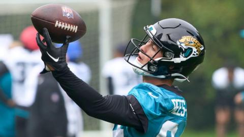 Louis Rees-Zammit catches a pass in training for the Jacksonville Jaguars