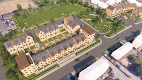 A digital image of the proposed housing development, which shows two areas with homes connected by a green space with trees, bushes and a windy path.