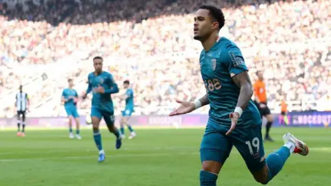 Justin Kluivert celebrates scoring for Bournemouth at Newcastle in the Premier league