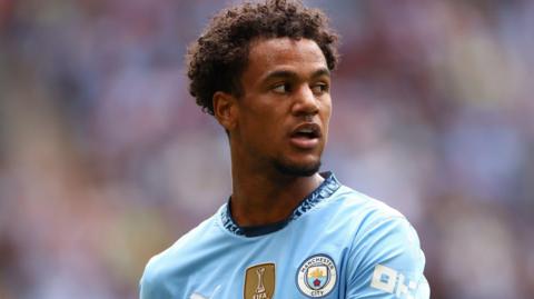 Oscar Bobb in action for for Manchester City in the 2024 Community Shield