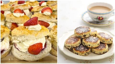 On one side is a plate of scones filled with jam and cream, on the other a plate of traditional Welsh cakes.