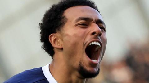 Millwall's Femi Azeez celebrating a goal