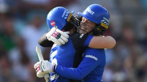 London Spirit batters Heather Knight (left) and Georgia Redmayne (right) embrace after beating Oval Invincibles