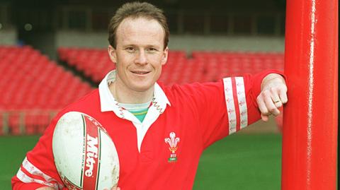 Former Wales international Paul Thorburn poses with a rugby ball in 1996