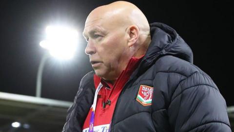 John Kear watches Wales train